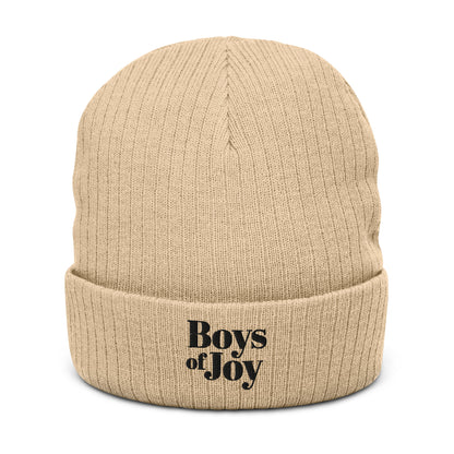 Beige ribbed beanie, angled product view; cuffed with ‘Boys of Joy’ embroidery.