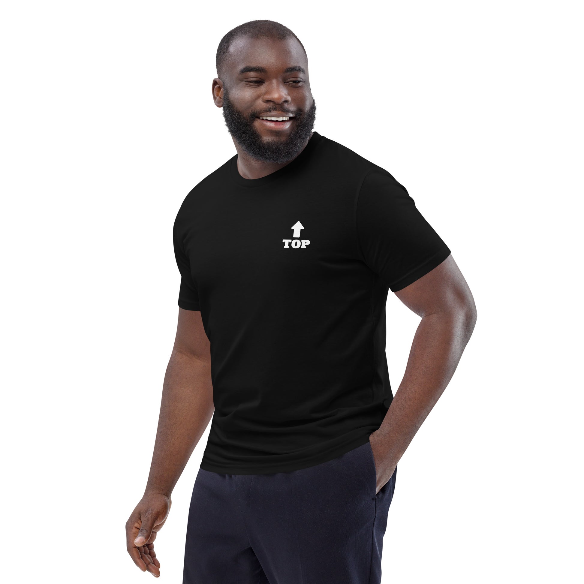 Model wearing Boys of Joy black tee, three-quarter view, chest “TOP” with upward arrow.