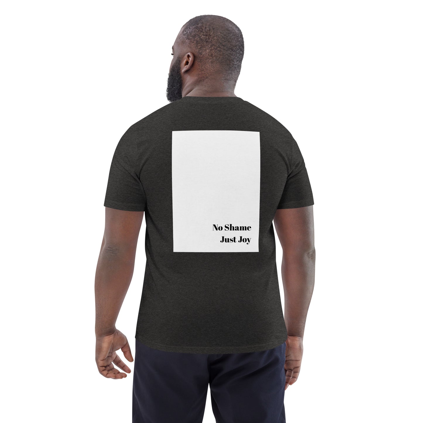 Model wearing dark heather grey Boys of Joy tee, back view with large white rectangle and “No Shame Just Joy” print.
