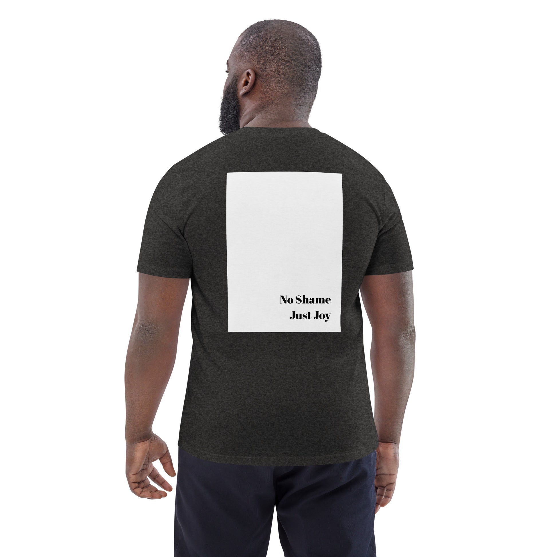Model wearing dark heather grey Boys of Joy tee, back view with large white rectangle and “No Shame Just Joy” print.