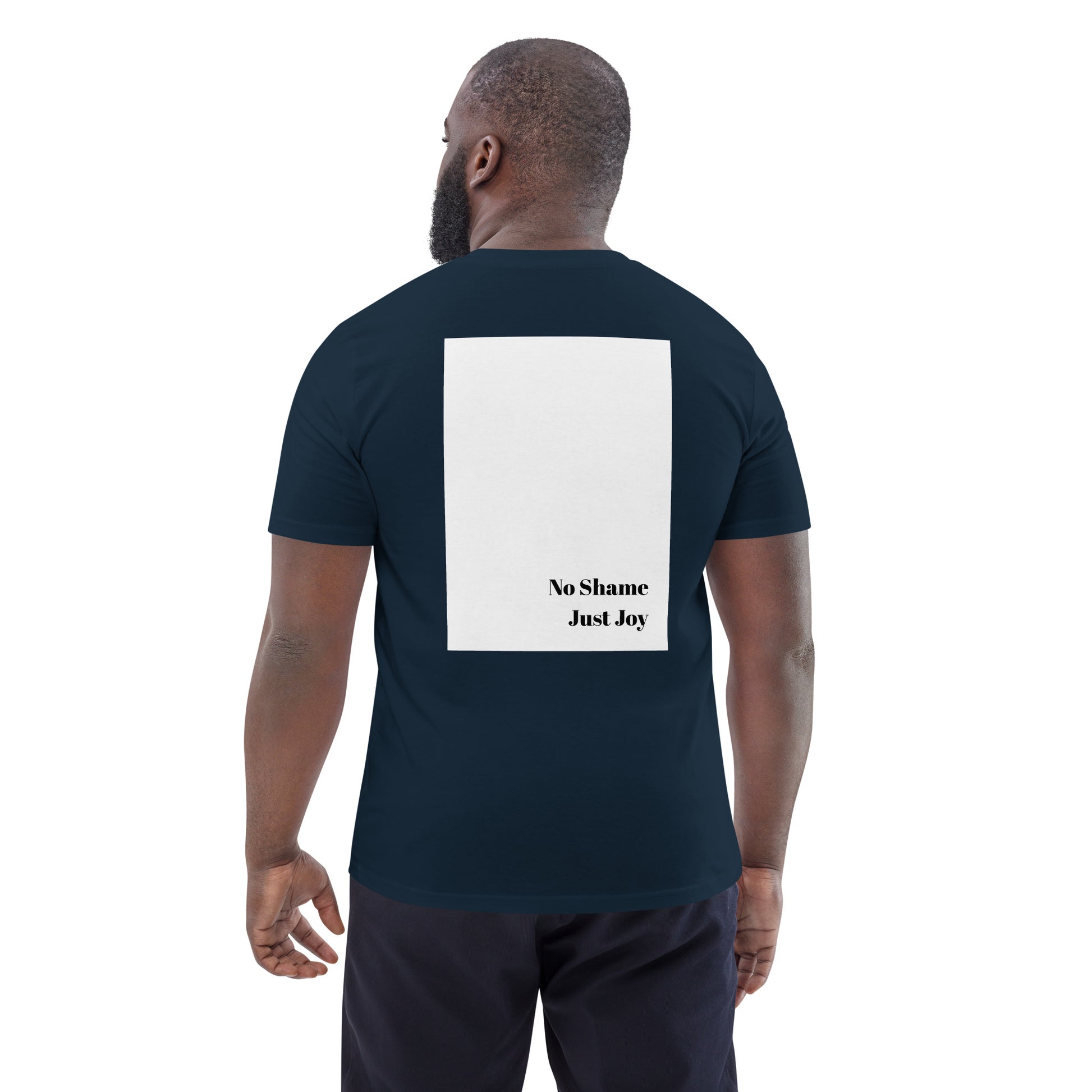 Model wearing French navy Boys of Joy tee, back view with large white rectangle and “No Shame Just Joy” print.